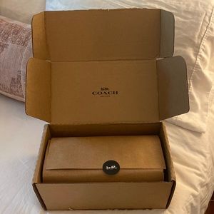 Brand new coach belt bag with gold chain and black leather